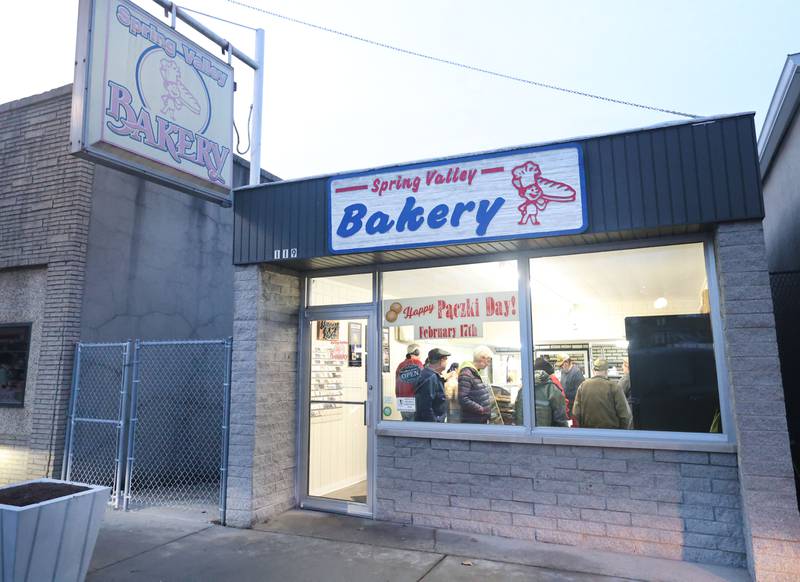 A view of the "Happy Paczki Day" sign outside the Spring Valley Bakery on Tuesday, Feb. 17, 2026 in Spring Valley.  Paczkis are rich, deep-fried Polish doughnuts traditionally filled with fruit preserves such as plum or rose hip jam and topped with powdered sugar or glaze. The pastries date back to the 1700s, when Polish bakers used up sugars, jellies and other ingredients to create the treats ahead of Lent.