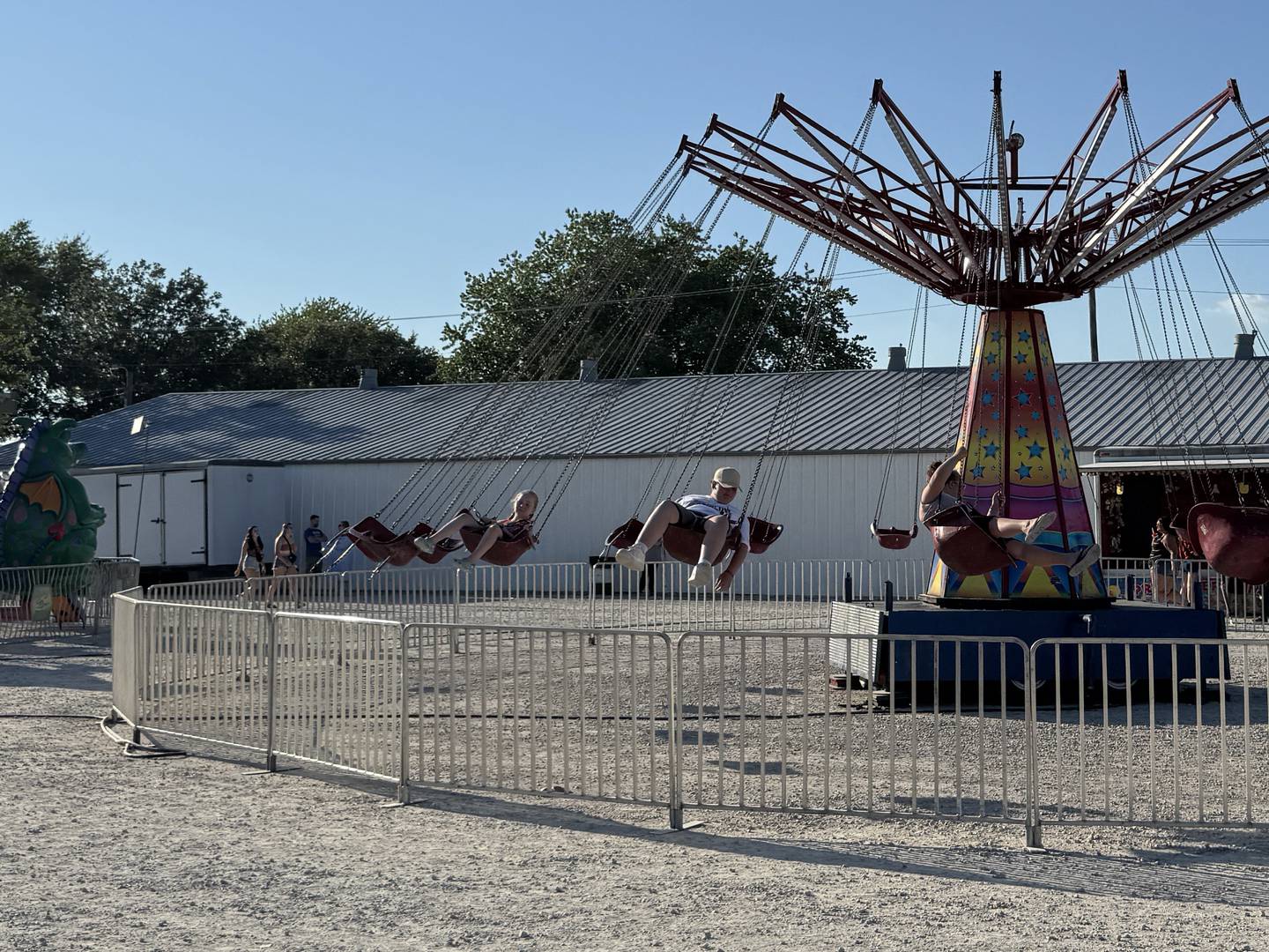 People ride the rides at the Grundy County Fair on Thursday, July 3, 2025.