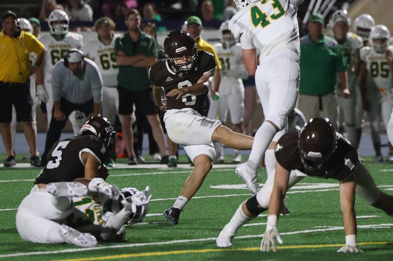 Joliet Catholic's Patrick Durkin connects for his fourth field goal against Providence on Friday, Sept. 1, 2023 Joliet Memorial Stadium.