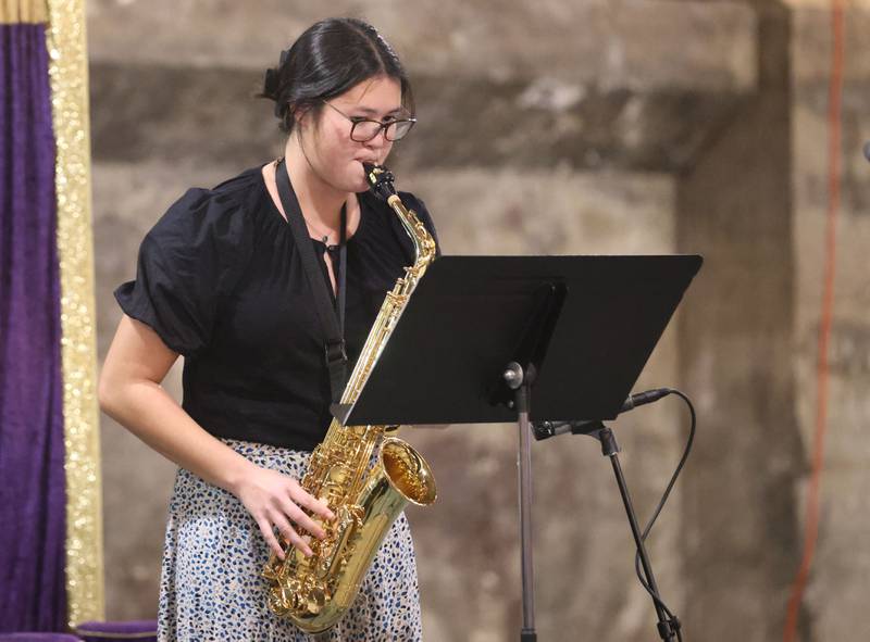 Zulee Moreland, a senior at Ottawa Township High School, plays the saxophone during the 9th annual NCI Artworks Mad Hatter Ball on Friday, Jan. 16, 2026 at the Westclox Event Center in Peru. Moreland, performs with school, municipal and summer jazz bands. Moreland is interested in music education later in life.