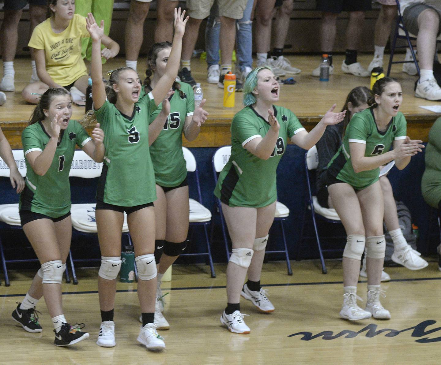 The Seneca volleyball team bench reacts after winning a point Thursday, Sept. 1, 2022, at Bader Gym in Ottawa.