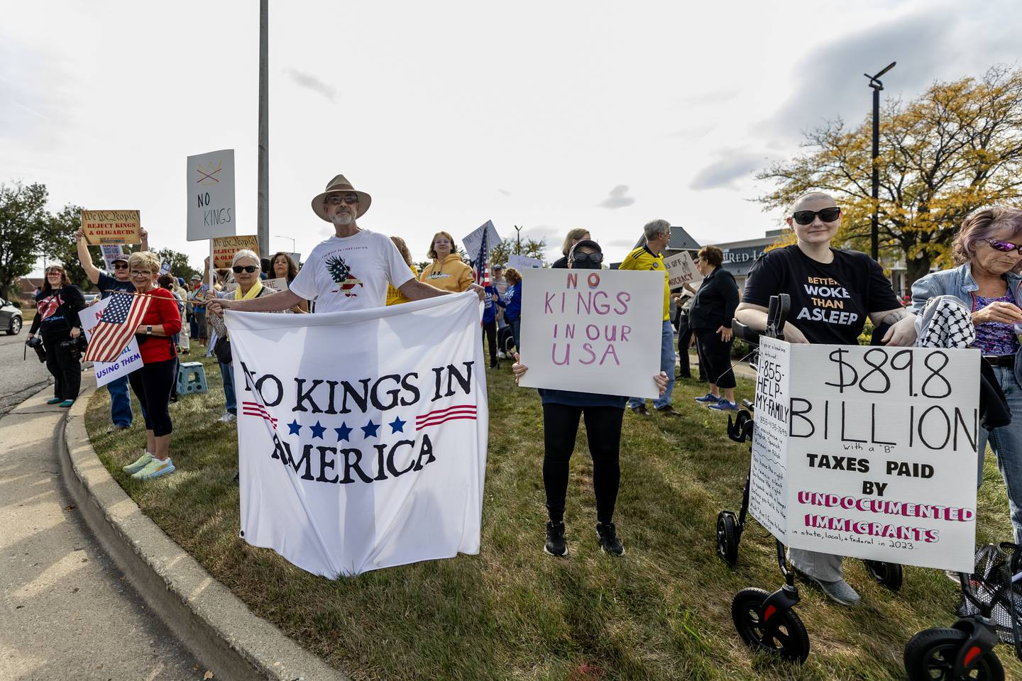 Protestors line Plainfield Road in Joliet during the No Kings Protest in Joliet on Oct. 18, 2025.