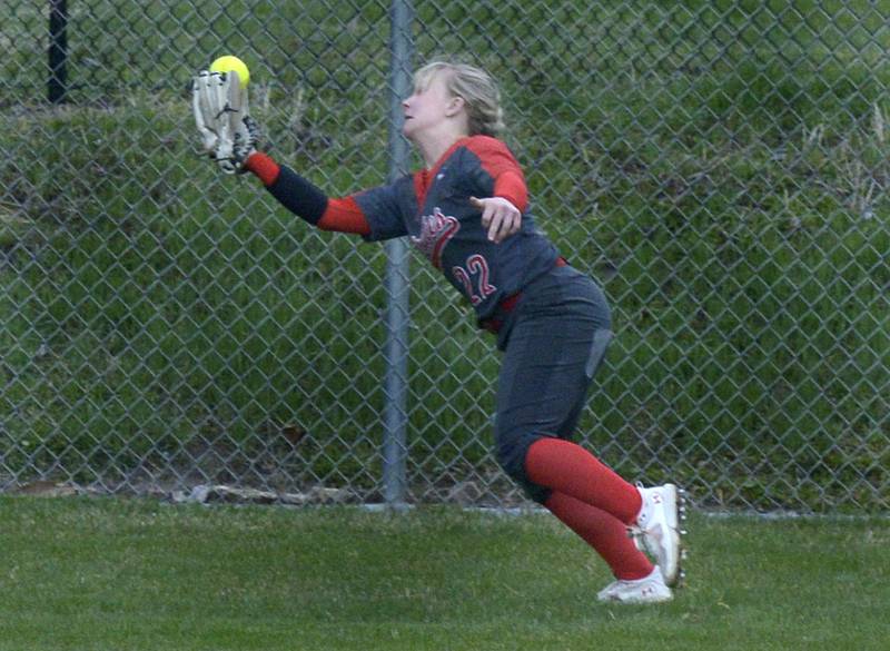 Ottawa left fielder Reese Purcell catches up to a fly ball in the 2nd inning Friday against Reed Custer at Ottawa.