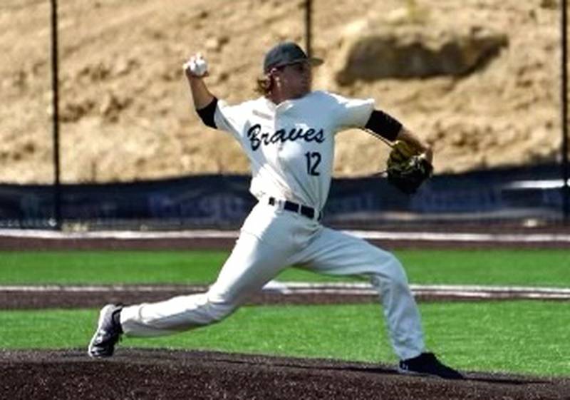 Hall graduate Jack Savitch throws a pitch during a game with Black Hawk College. After earning all-conference honors, Savitch will play next season at LSU-Shreveport.