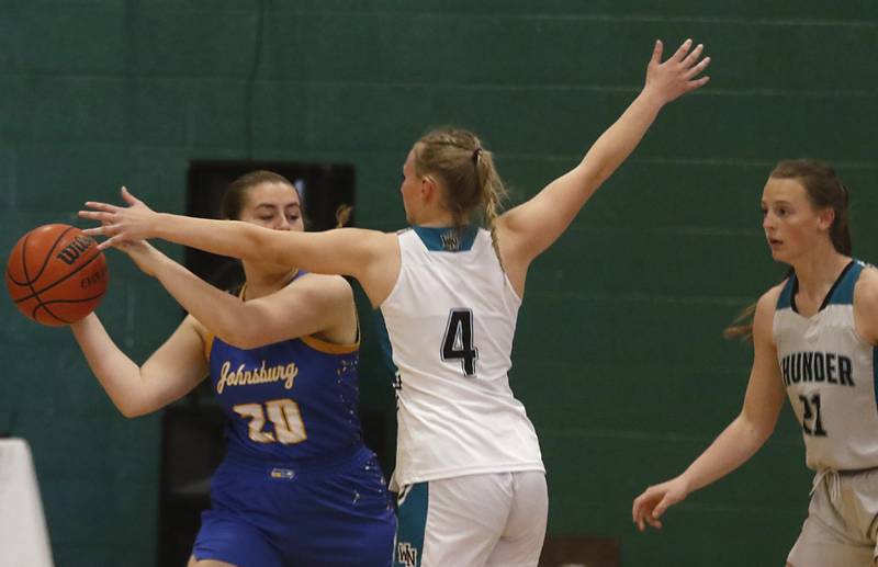 Johnsburg’s Kiara Welch is guarded by Woodstock North's Caylin Stevens during the girl’s game of McHenry County Area All-Star Basketball Extravaganza on Sunday, April 14, 2024, at Alden-Hebron’s Tigard Gymnasium in Hebron.