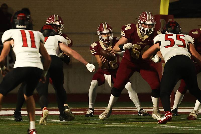 Morris’ Brady Varner takes the snap against Highland on Saturday, Nov. 9, 2024 in Morris.