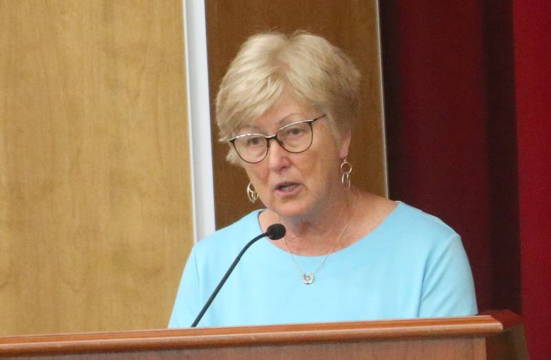 Nancy Tuftie speaks to the Illinois Health Facilities and Services Review Board during a public hearing regarding OSF St. Elizabeth Hospital's plans to reduce services on Tuesday, June 10, at Central Intermediate School in Ottawa.