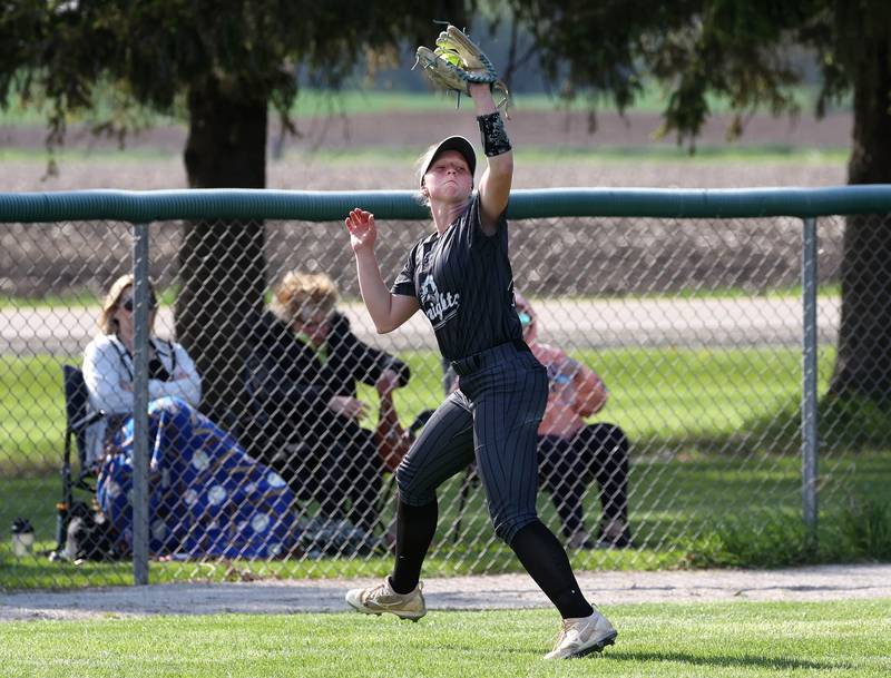 Kaneland's Riley Cooper makes a catch near the fence during their game against Sycamore Wednesday, May 7, 2025, at Kaneland High School in Maple Park.