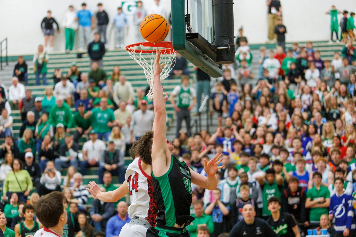 York's Hunter Stepanich goes in for the basket against Glenbard East at the Class 4A Bartlett Sectional Final on Friday, March 6,2026 in Bartlett.