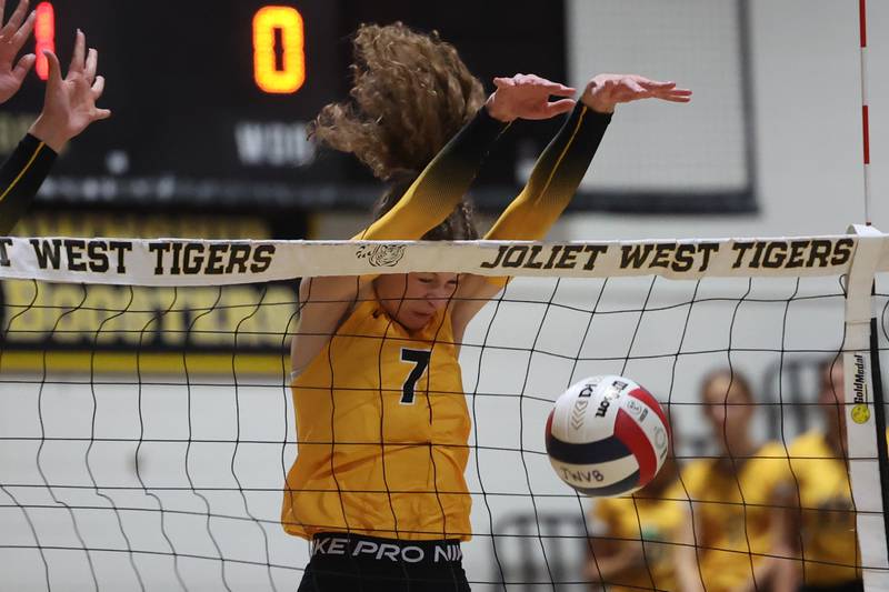 Joliet West’s Gabby Piazza gets the point off a block against Plainfield North on Wednesday, Sept. 6, 2023 in Joliet.