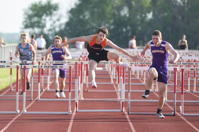 Milledgeville's Kacen Johnson clears the final hurdle in the 110 meter hurdles at the class 1A Erie track sectionals on Thursday, May 19, 2022.