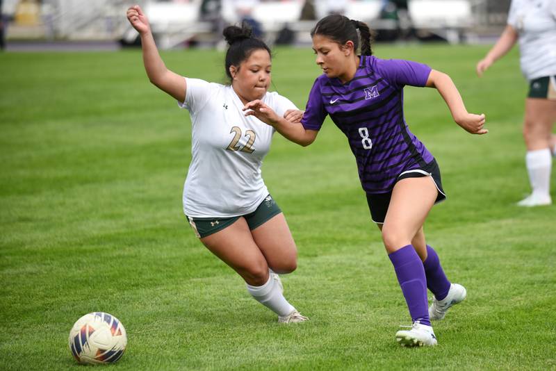 Bishop McNamara's Violeta Alvarado, left, defends Manteno's Litzy Campos-Avila during a game at Manteno Wednesday, April 29, 2026.