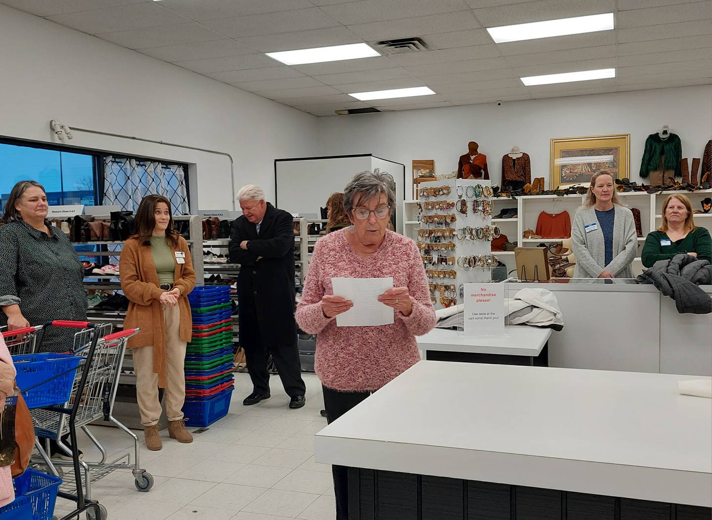 Joanne Kloepping reads Thursday, Jan. 18, 2024, the names of 36 organizations that received a total of $217,000 from The Closet in Princeton.