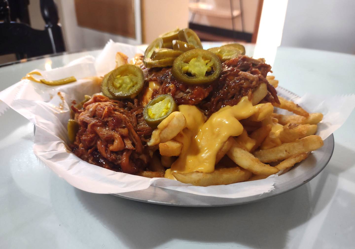 Dirty fries are one of the handful of appetizers on the menu at Ryan's Eater in Marseilles. The thick fries are topped with pulled pork, cheese sauce and jalapeños.