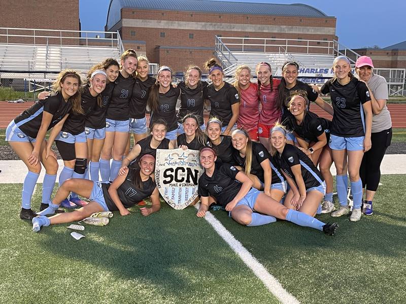 St. Charles North girls varsity soccer posing after defeating Batavia 3-1 on Thursday to win the DuKane Conference.