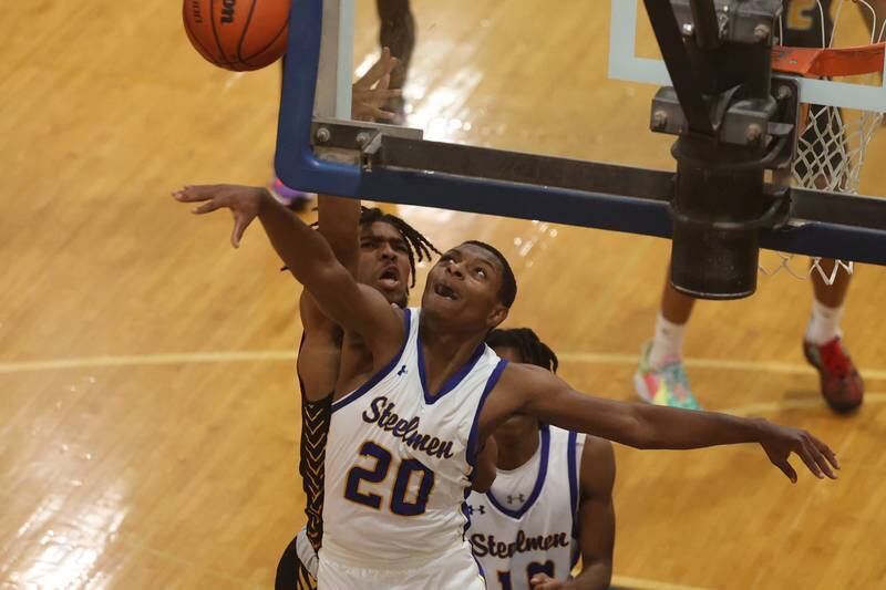 Joliet Central’s Isaiah Molette blocks a shot against Joliet West.