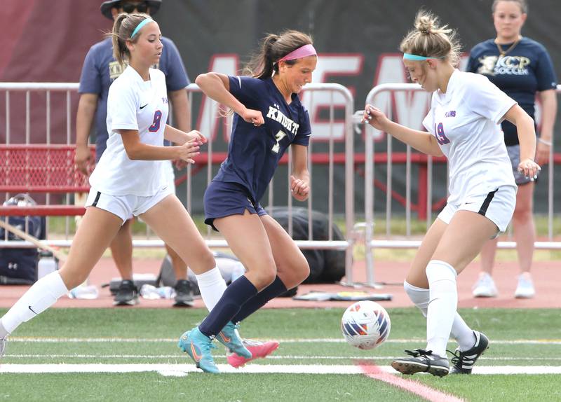 IC Catholic Prep's Grazie Narcisi splits two Pleasant Plains defenders during the IHSA Class 1A state girls soccer third place game Saturday, May 27, 2023, at North Central College in Naperville.