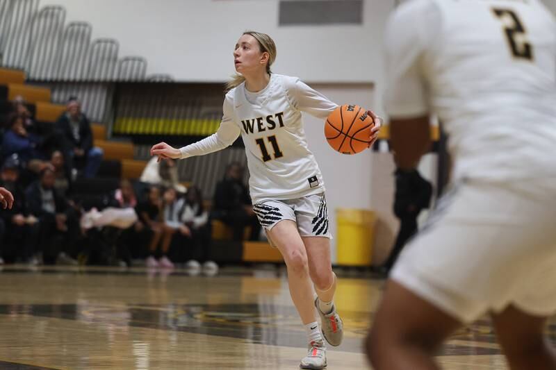 Joliet West’s Samantha Casanova looks for a play against Joliet Central on Thursday, Jan 30, 2025 in Joliet.