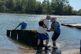 Volunteer groups help clean up Fox River in St. Charles