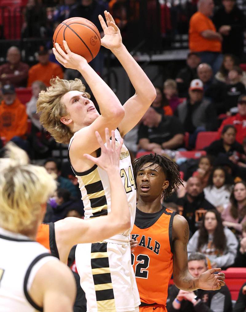 Sycamore's Lucas Winburn gets inside the DeKalb defense for a basket during the First National Challenge Friday, Jan. 27, 2023, at The Convocation Center on the campus of Northern Illinois University in DeKalb.