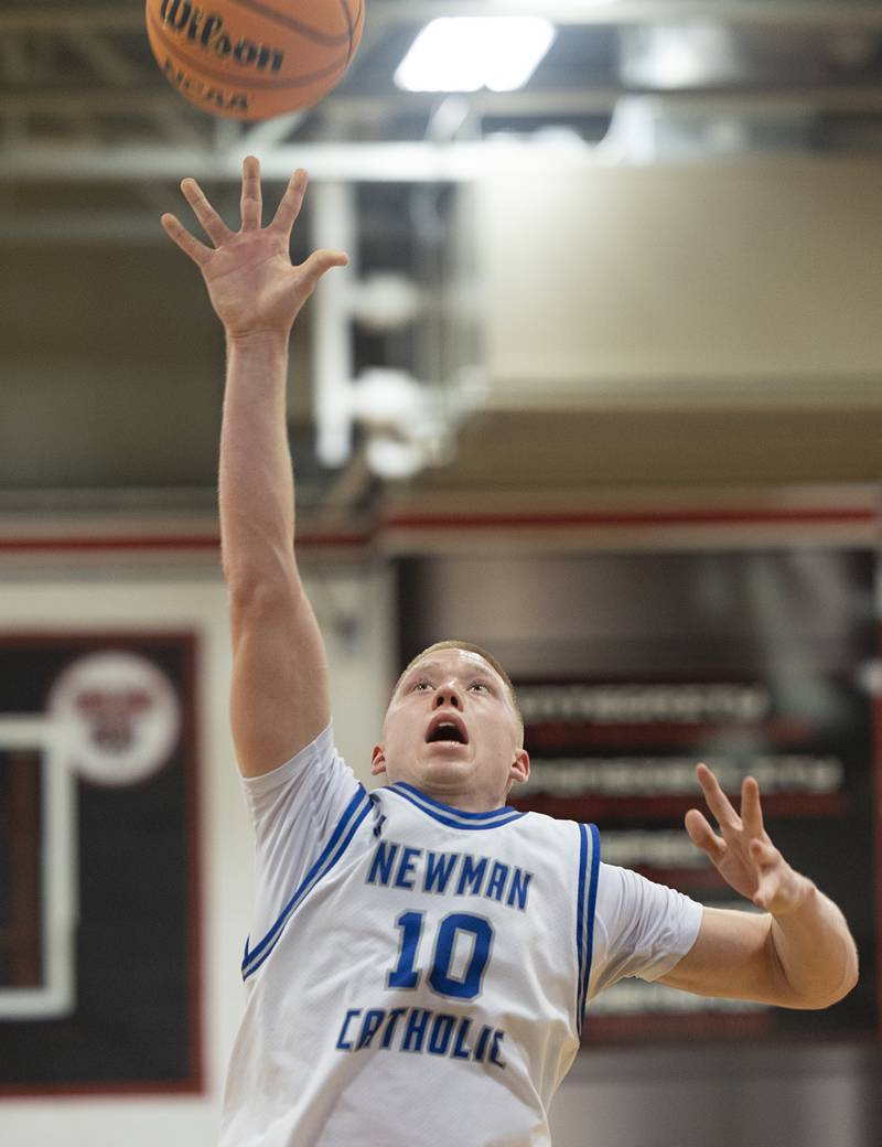 Newman’s George Jungerman hoists up a last second shot but sees the Comets’ season end 70-66 to Pecatonica in OT Tuesday, March 3, 2026, in the 1A sectional semifinal.