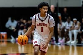 Photos: Oswego East vs. Bolingbrook Boys Basketball