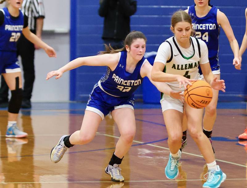 Princeton's Camryn Driscoll tries to strip the ball from Alleman's Lilli Lempke in Thursday's regional championship game at Prouty Gym. The Pioneers won 40-27.