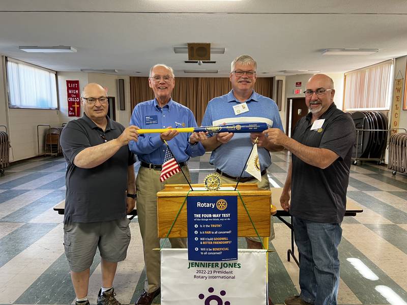 The Rotary Club of Ottawa Sunrise was recently awarded the Rotary Louisville Slugger Trophy Bat for hitting it out of the park in their donations to the Rotary Foundation. Jim McMurdo  of the District 6420 Foundation Committee, presented the trophy bat to President Rick Scott, Foundation Chair Mike Matteson and Treasurer Joe Schimdt.