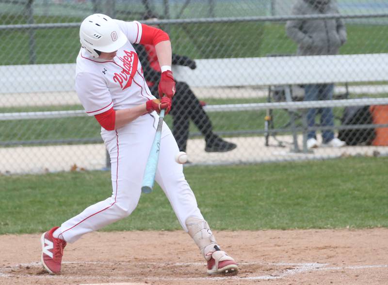 Ottawa's Adam Swanson smacks a hit against Hall on Tuesday, April 1, 2025 at Ottawa High School.