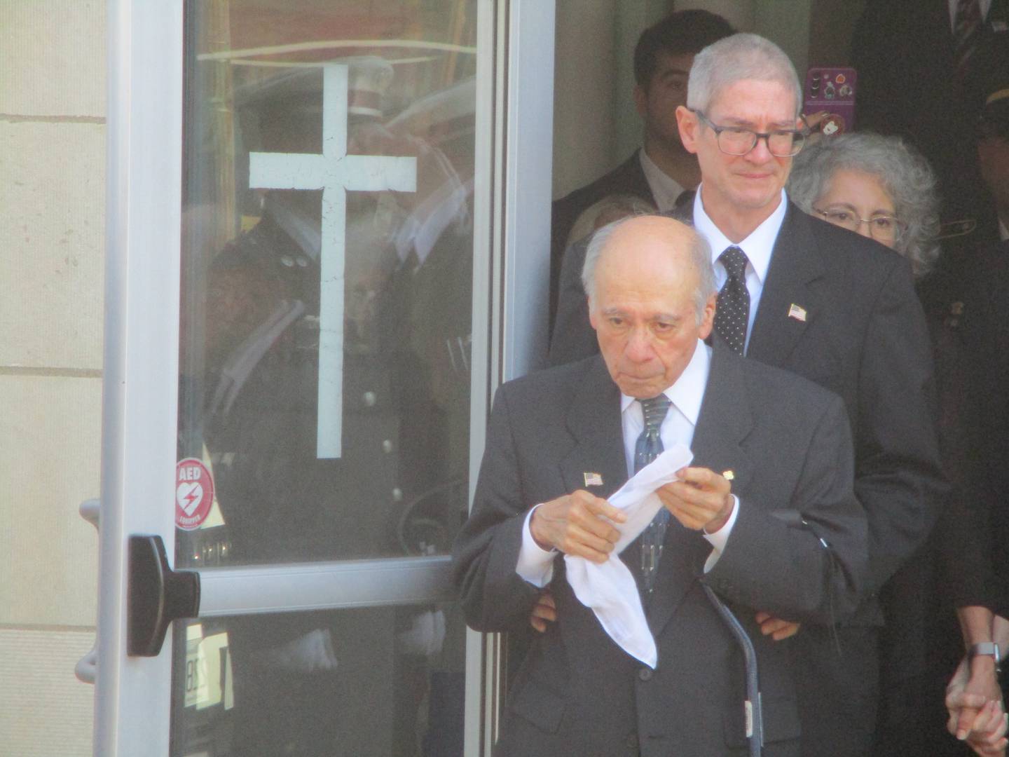 Richard Vega leaves St. Joseph's Catholic Church in Joliet after a funeral mass for his brother Vincent, whom he last saw when Vincent was a teenager before joining the Army and fighting in the Korean War. Oct. 3, 2025