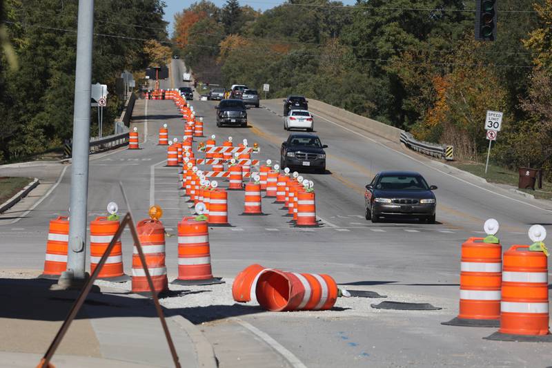 Construction barrels line Briggs Street at the intersection of East Washington Street in Joliet.