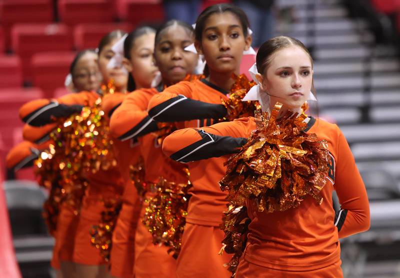 The DeKalb cheerleaders stand during the National Anthem before the girls game Friday, Jan. 31, 2025, during the FNBO Challenge in the Convocation Center at Northern Illinois University in DeKalb.