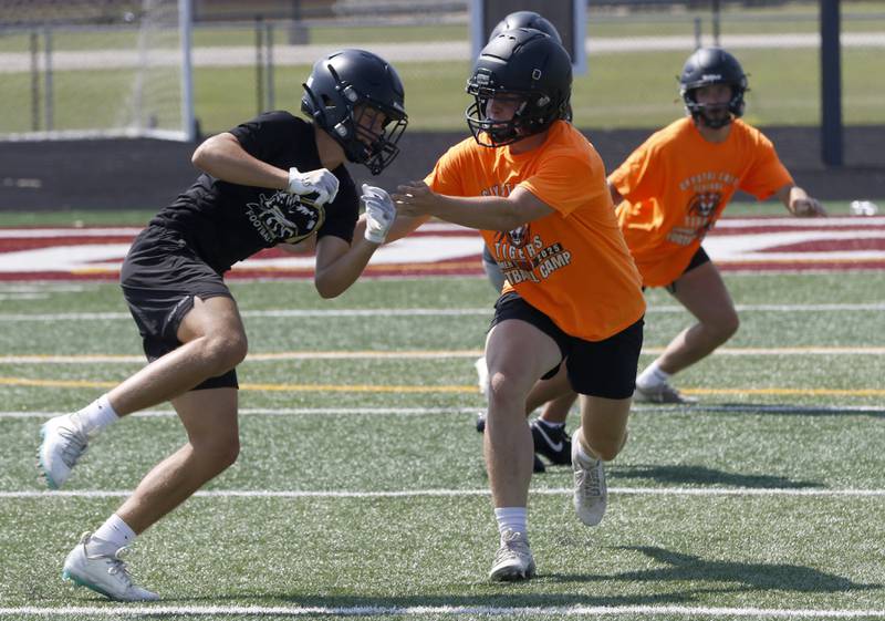 Crystal Lake Central’s Will Nieckula plays defense during a 7 on 7 football practice Monday, July 14, 2025, at Richmond-Burton High School, with teams from Richmond-Burton . Grayslake Central and Mundelein.