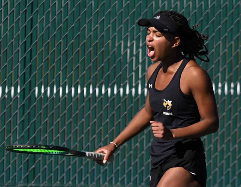 Hinsdale South’s Chloe Goins celebates as she closes in on victory in the Class 1A singles championship match of the girls state tennis tournament at Hersey High School on Saturday, Oct. 26, 2024 in Arlington Heights.