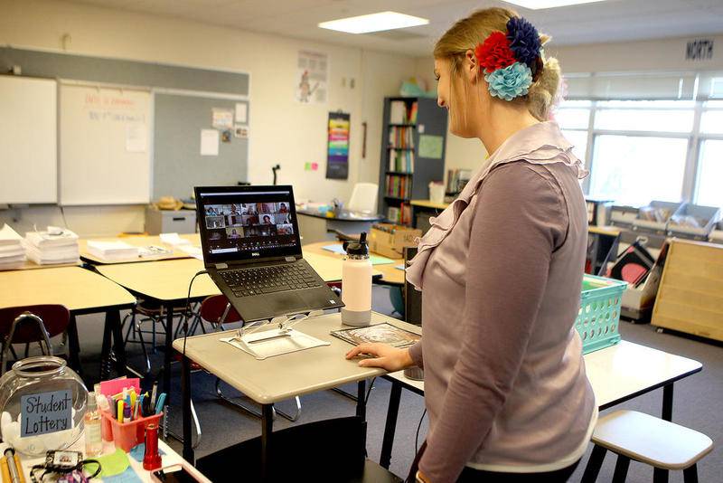 Kaneland McDole Elementary School teacher Ally Van Bogaert teaches to an exclusively remote group of students using Zoom from her classroom at the school.