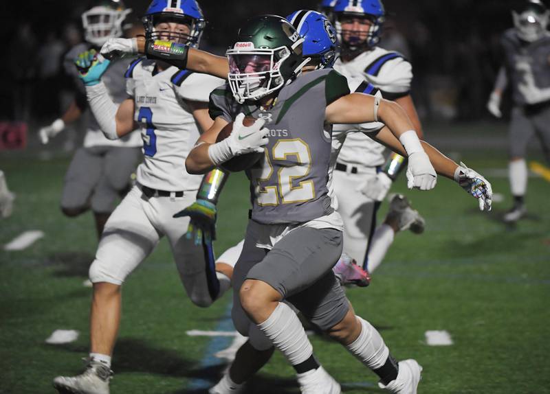 Stevenson’s Christopher Thorndyke makes a cut to get a clear lane and score the first touchdown of the game against Lake Zurich in a football game in Lincolnshire on Friday, September 8, 2023.