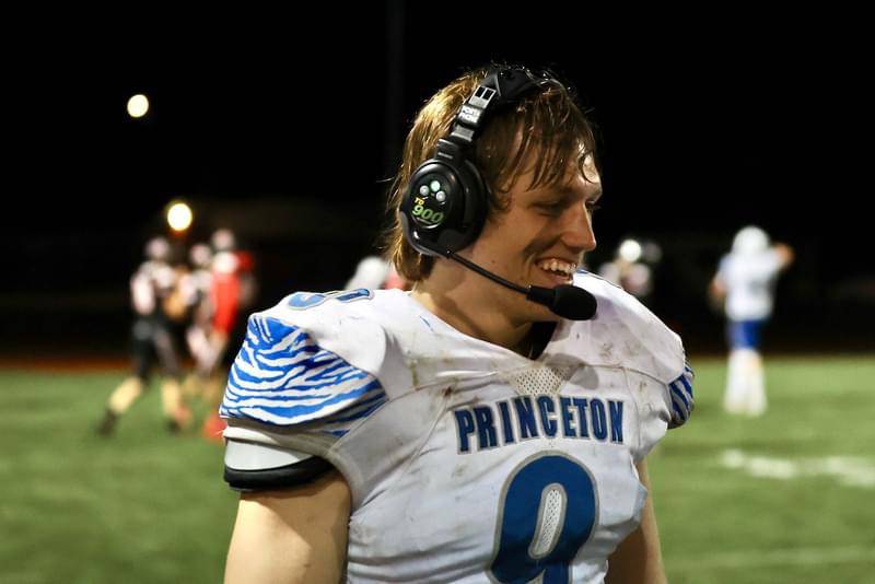 Princeton's Arthur Burden dons the headset late in Friday's game at Prophetstown. The Tigers won 61-14.