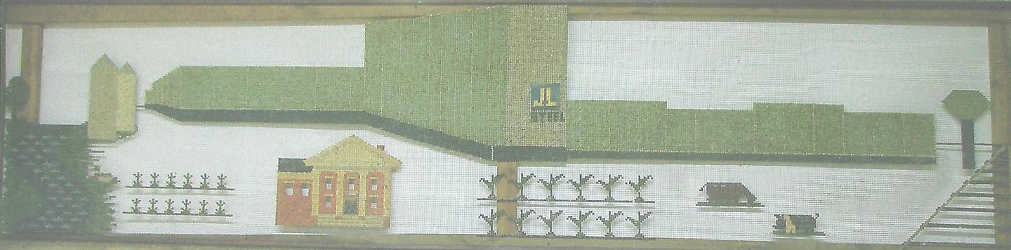 John “Junior” Washington created an 8 foot long mosaic of the J&L steel mill and Putnam County Court House using colored soybeans inserted in wire mesh.