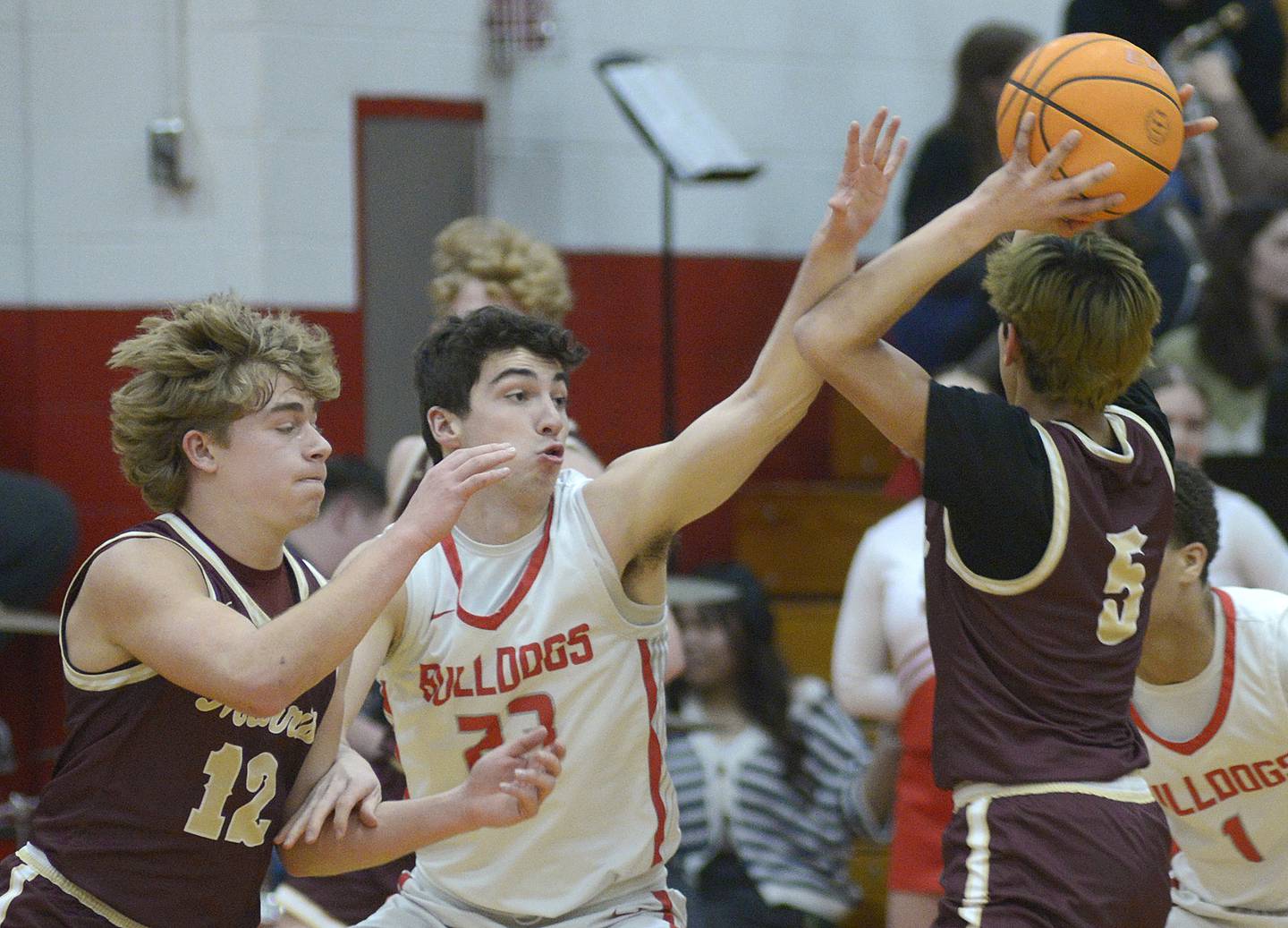 Streator’s Colin Byers works to block the passing lane of Morris’s Luis Loza in the 1st quarter Wednesday at Streator.