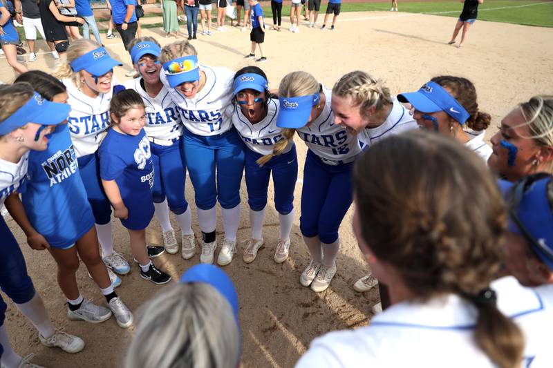 St. Charles North players celebrate their Class 4A St. Charles North Supersectional win over Whitney Young on Monday, June 3, 2024.