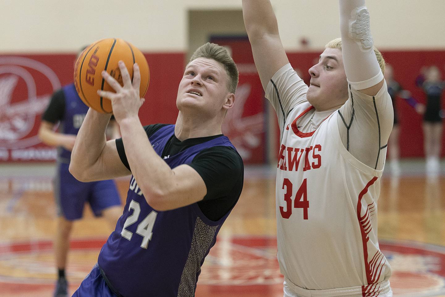 Dixon’s Eli Davidson looks to put up a shot against Oregon’s Kade Girton Tuesday, Feb. 4, 2025, in Oregon.