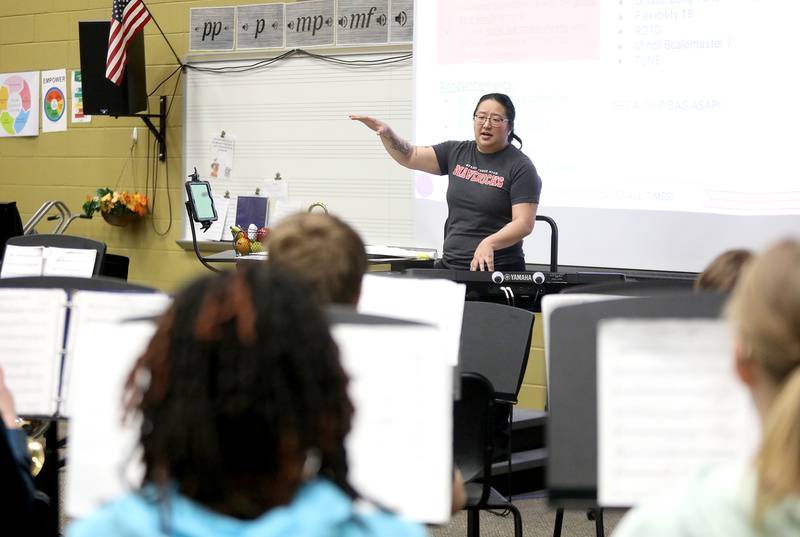 Murphy Junior High School Band Director Julianna Karvelius directs a seventh-grade brass class at the Plainfield school. Murphy Junior High School is part of Oswego Community Unit School District 308.