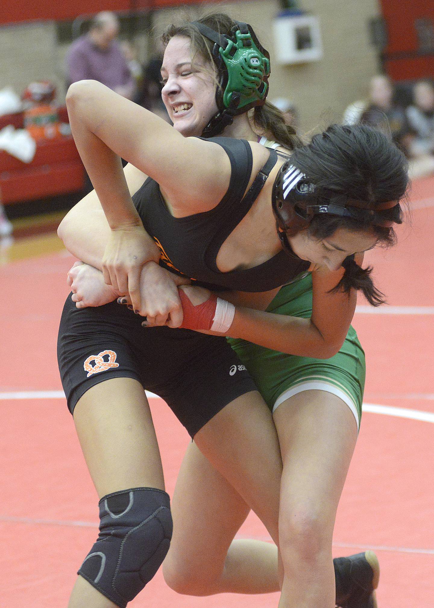 Seneca's Haven Nicolaides battles against Freeport's Kaiya Galindo in a 115-pound bout at Monday's Ottawa Holiday Hootenanny Invite in Kingman Gymnasium.