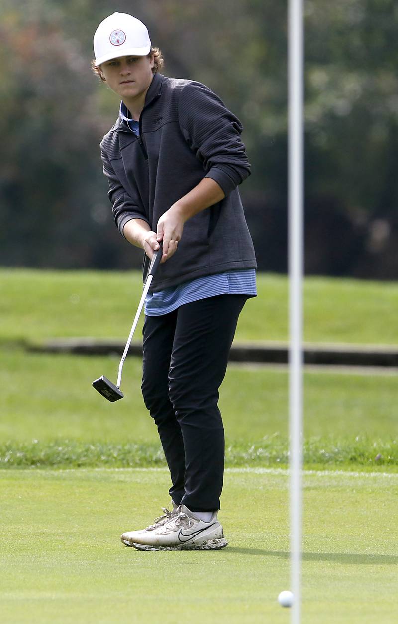Burlington Central’s Matthew Kowalik putts on the seventh green during the Fox Valley Conference Boys Golf Tournament Thursday, Sept. 21, 2023, at McHenry Country Club in McHenry.