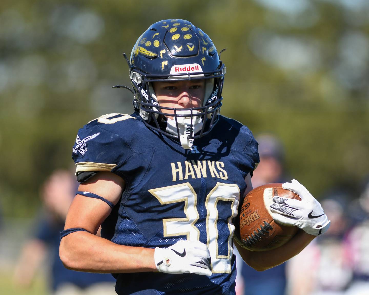 Hiawatha's Tim Pruitt (30) runs the ball into the endzone for a touchdown during the game on Saturday Oct. 11, 2025, while taking on Rockford Christian Life held at Hiawatha High School.