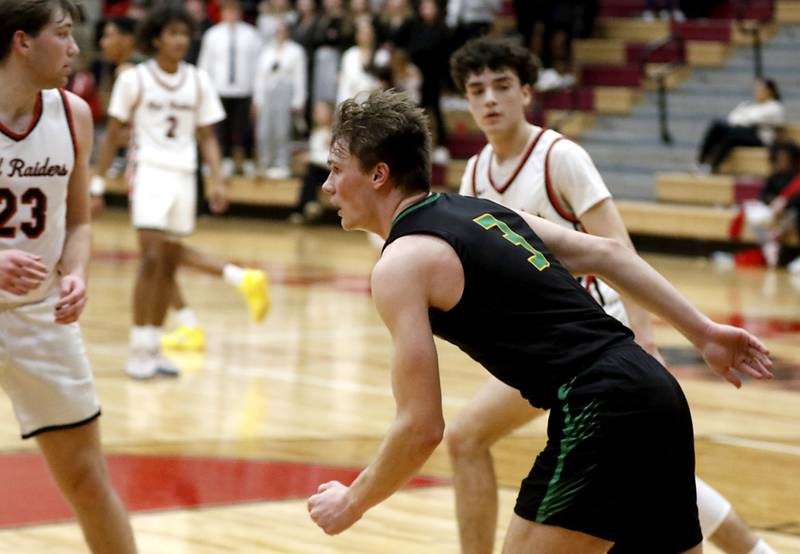 Crystal Lake South's Colton Hess celebrates his dunk during a Fox Valley Conference boys basketball game against Huntley on Tuesday, Feb.6, 2024, at Huntley High School.
