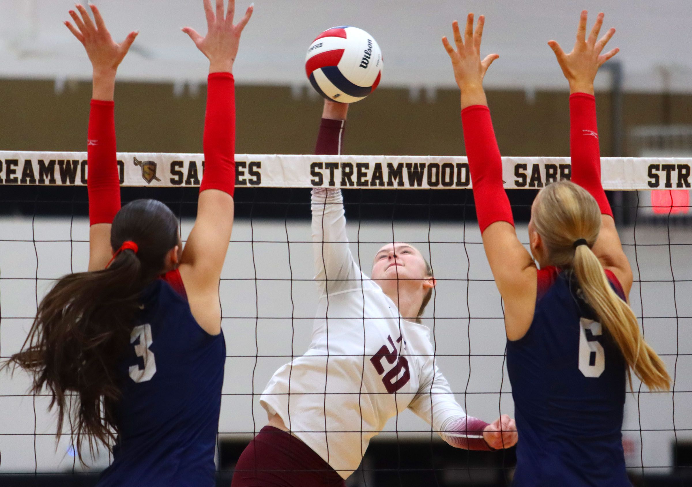 Prairie Ridge’s Ava Bell hits the ball against St. Viator in IHSA Class 3A Super-Sectional girls volleyball at Streamwood High School in Streamwood on Monday, November 10, 2025.
