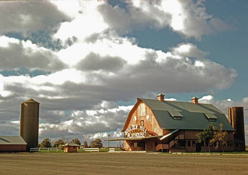 TThe Boulder Hill Playhouse opened in 1958 with an innovative revolving stage that allowed three sets for the community theatre plays, style shows, and other events held in the converted dairy barn renovated by developer Don L. Dise. Today, Boulder Hill is home to more than 9,000 residents.