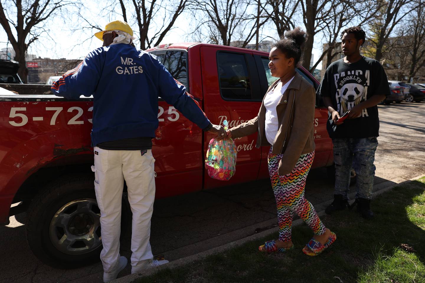 Roger Gates hands out Easter baskets from his pickup truck. For years Roger Gates has been giving out easter baskets in the community. Saturday, April 16, 2022, in Joliet.