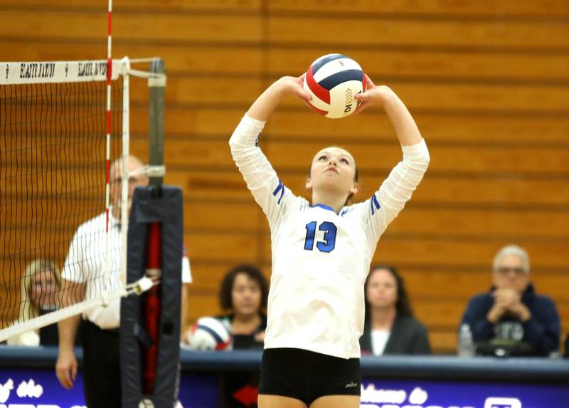 Geneva’s Bridget Feichter sets the ball during the Class 4A Addison Trail Regional final against Wheaton Warrenville South on Thursday, Oct. 26, 2023.